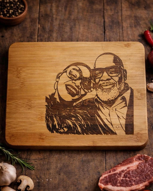 Wooden cutting board with engraved portrait on a rustic wooden surface with food items.