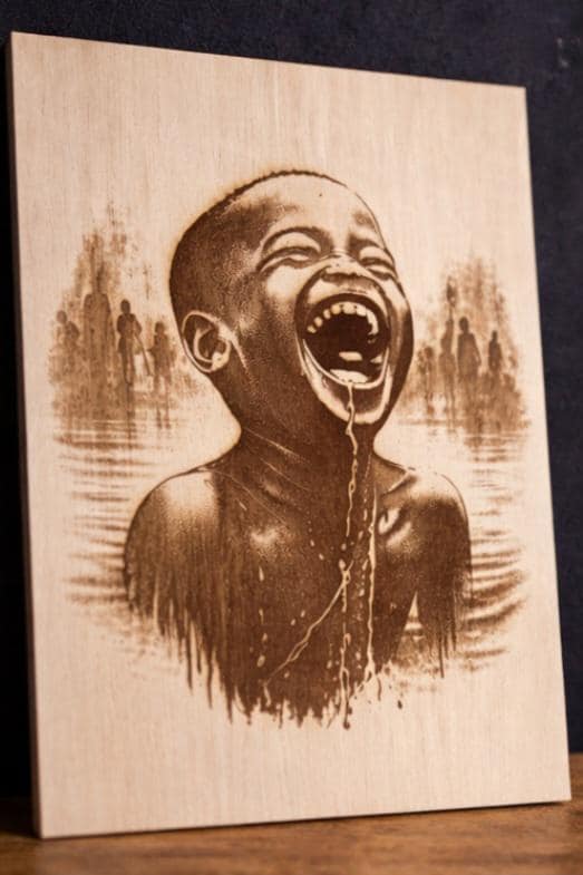 African Child Joy Wood Engraving | 11x8 Laser Engraved Wall Art, Emotional Black Art